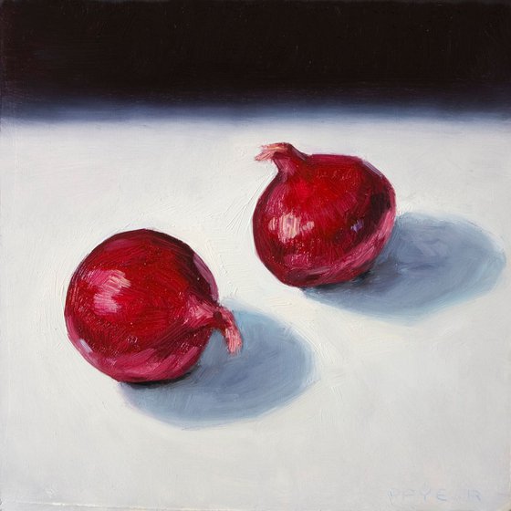 modern still life of a red onions