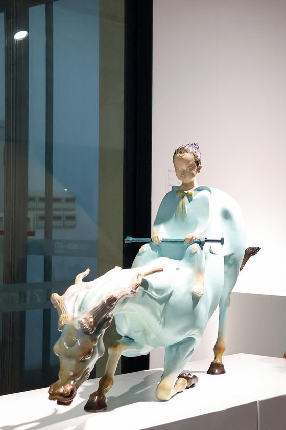 Boys Riding A Dragon Horse