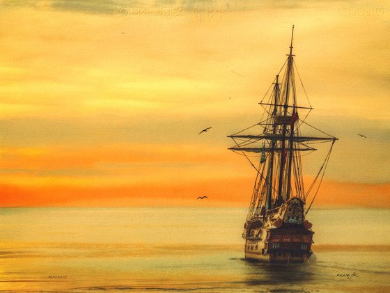 Sunset into the sea by old ship