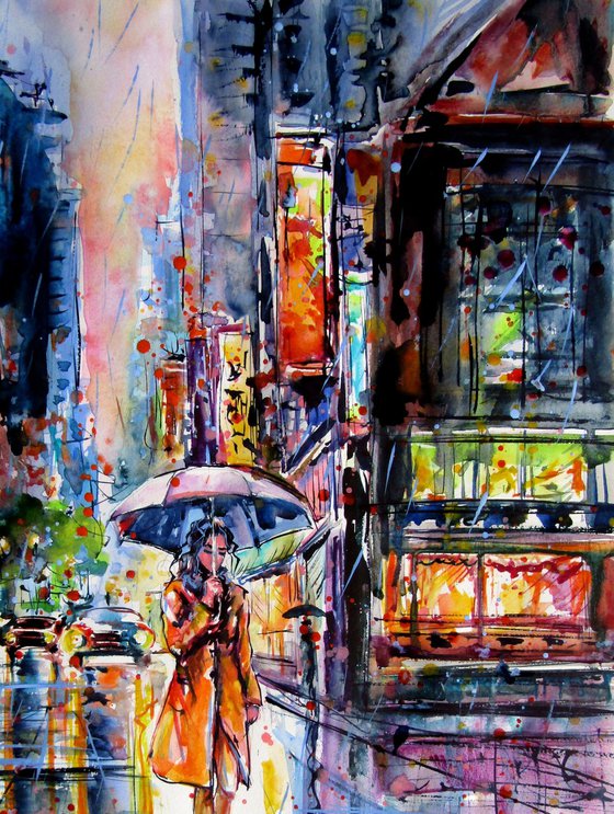 Woman walking in the rain