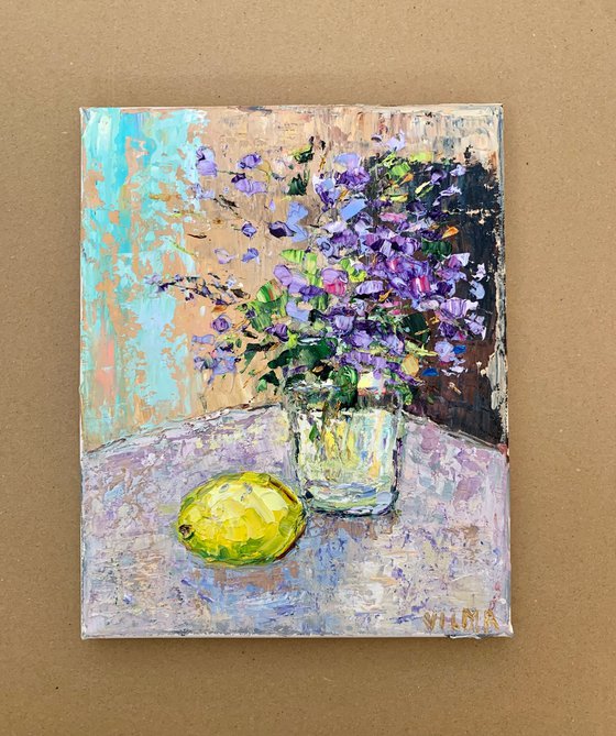 Still life with flowers and lemon