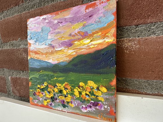 Orange sunset with flowers