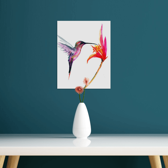 Flying Hummingbird and Flowers