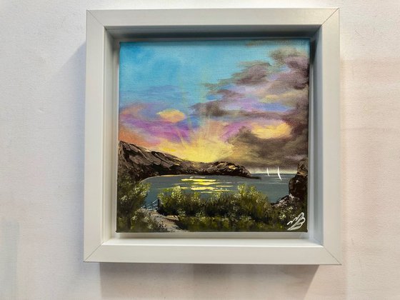 Sunrise over Lulworth Cove in a frame