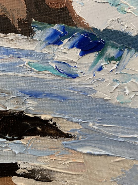 Sea rocks and beach.