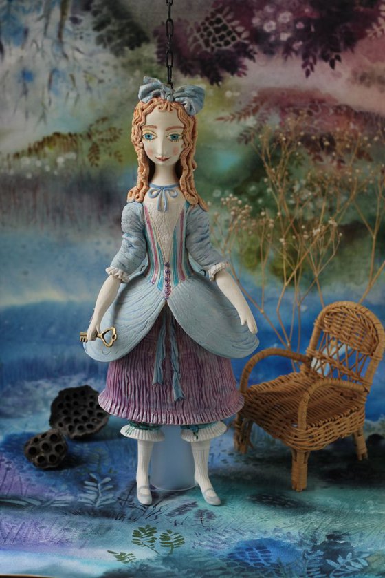 From the Alice in Wonderland. Alice, grown up. Wall sculpture by Elya Yalonetski