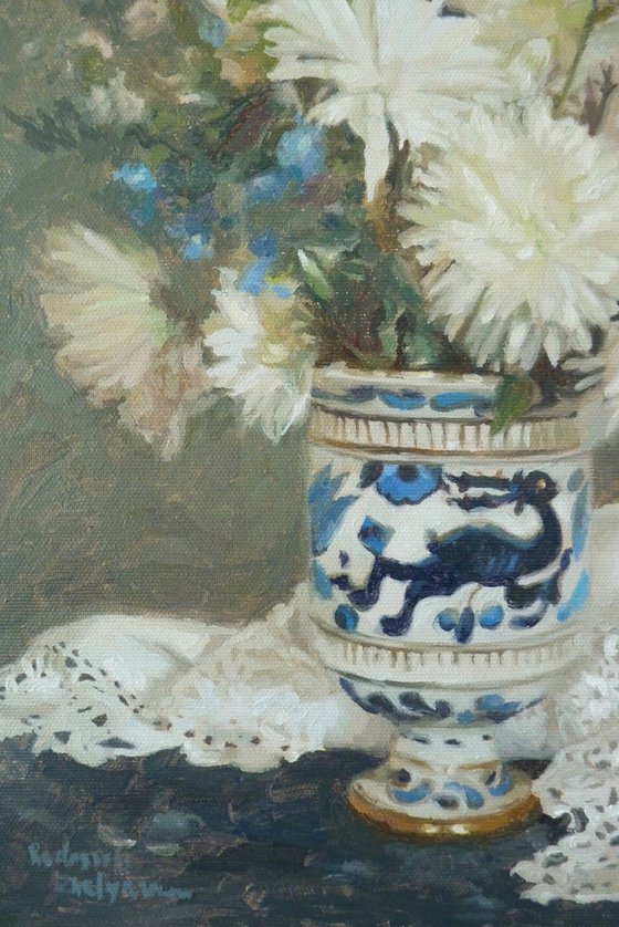 White flowers in a porcelain vase