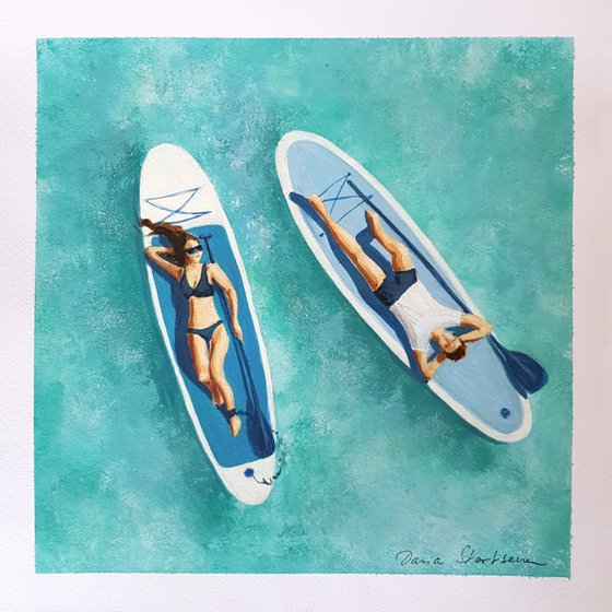 Couple on Sup boards
