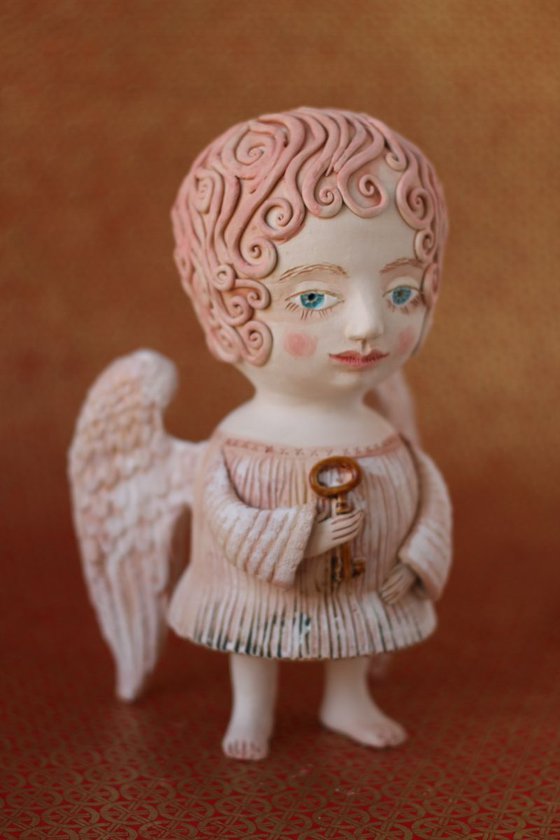 Angel holding a key. Ceramic OOAK sculpture by Elya Yalonetski