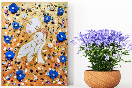Mother Earth and baby. Summer floral woman with blue flowers