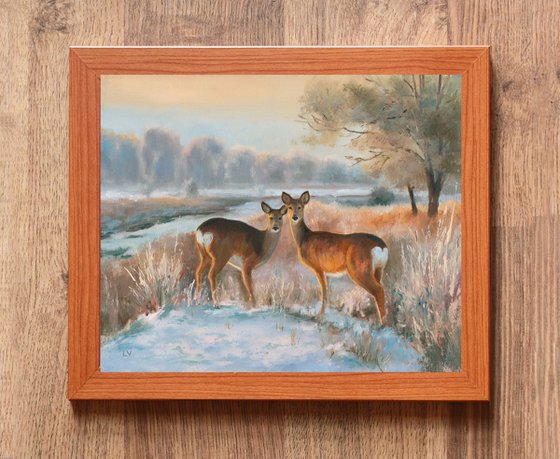 Snowy landscape with deer