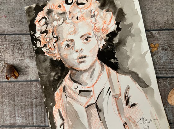 Portrait of a curly-haired boy