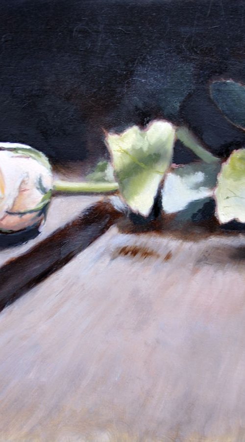 One white rose on the wooden table by Anna Brazhnikova