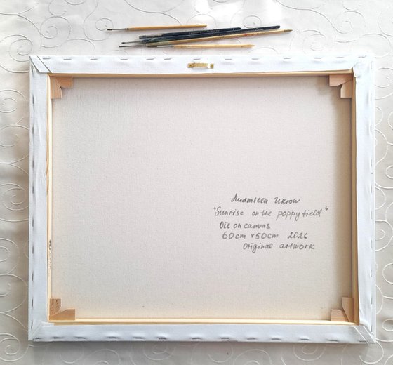 Sunrise on the poppy field