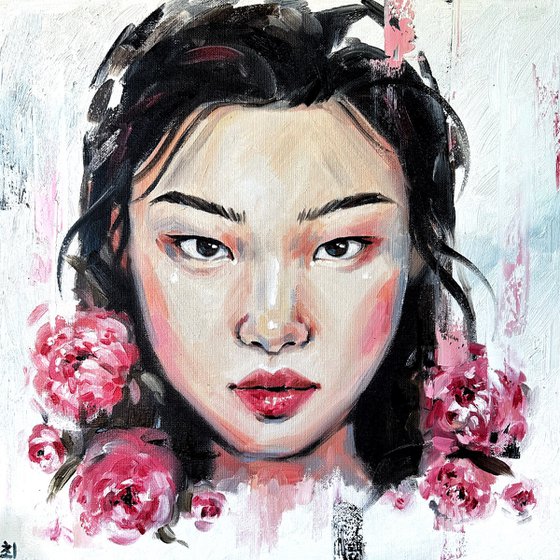 Asian woman with pink peonies