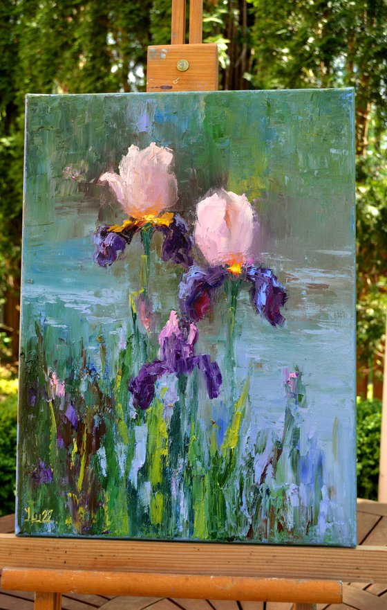 Three Irises by the pond