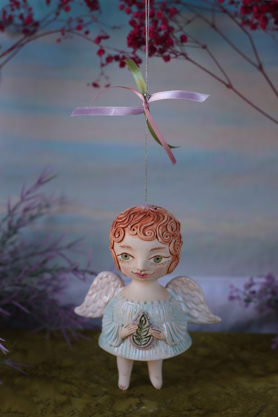 Tiny hanging sculpture. Angel