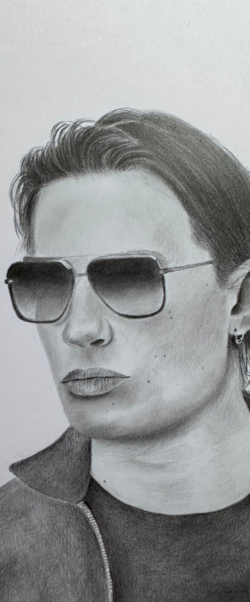 Male model in sunglasses by Maxine Taylor