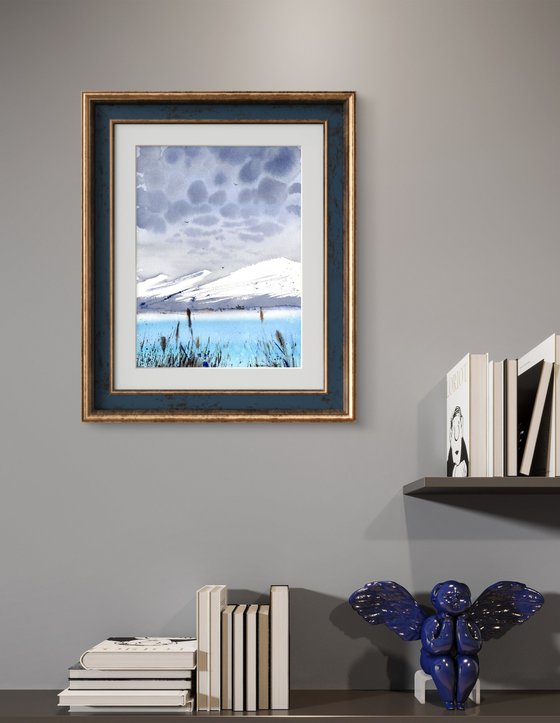 BLUE LAKE IN THE MOUNTAINS