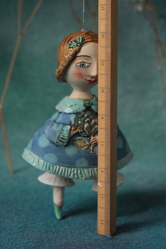 Little Girl in tender blue dress. Hanging sculpture, bell doll by Elya Yalonetski