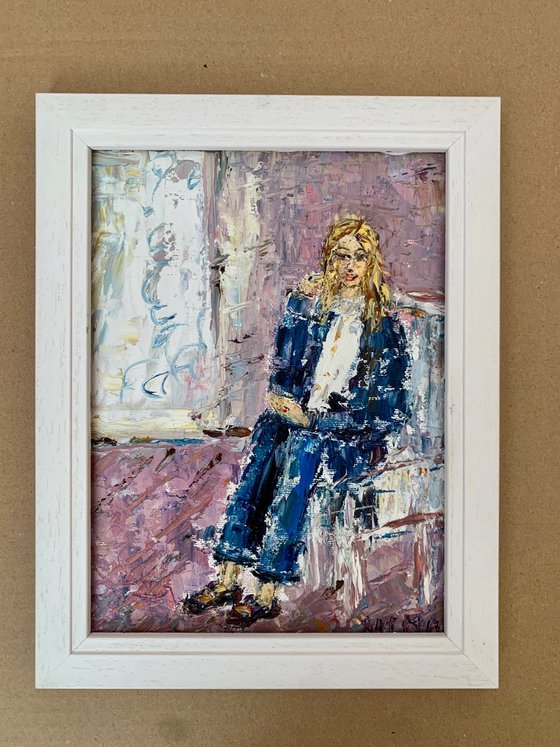 Portrait of a seated young woman