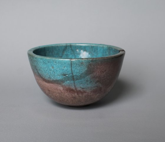 Raku Bowl with a smoked black stripe.