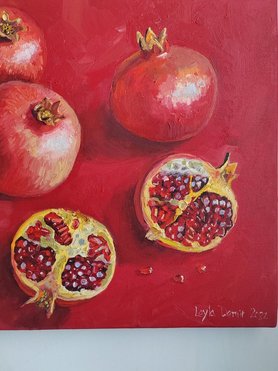 Pomegranate on red