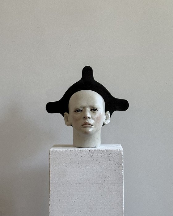 Head with black halo