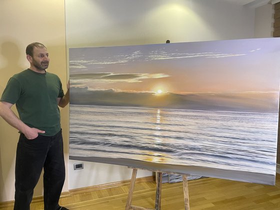 Golden Sunrise Over Calm Ocean