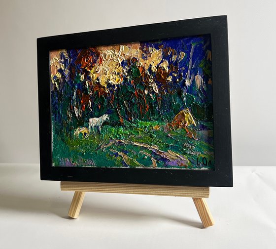 Yellow sunset behind tree