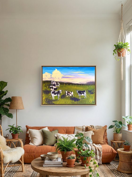 Cows grazing in the field