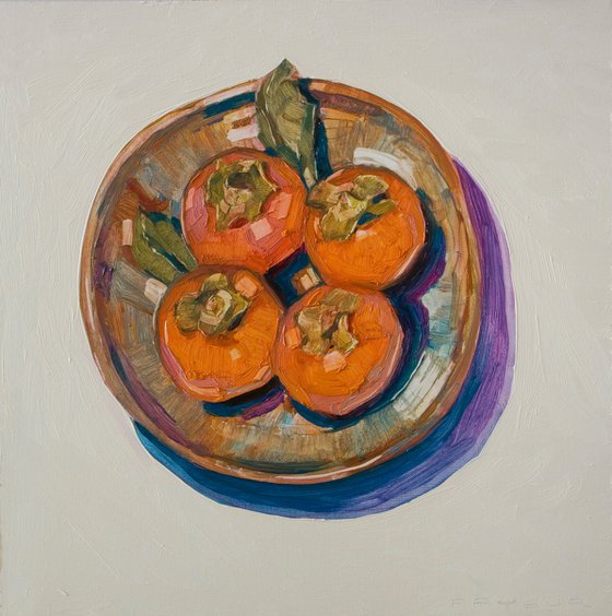 persimons in a plate