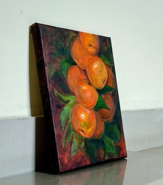 Still Life of a branch of Mandarin Oranges