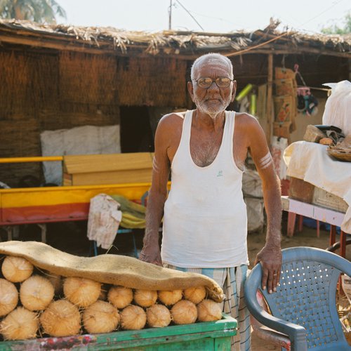 Coconut Seller by Dasha Buben