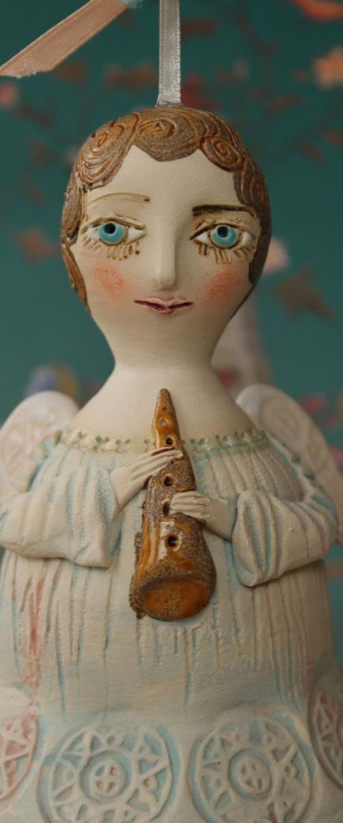 Angel with a flute. Bell-Doll, little ceramic sculpture. Hand made by Elya Yalonetski