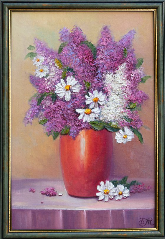 Flowers in a red vase