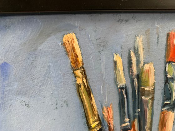 Still life. Artist paint brushes.