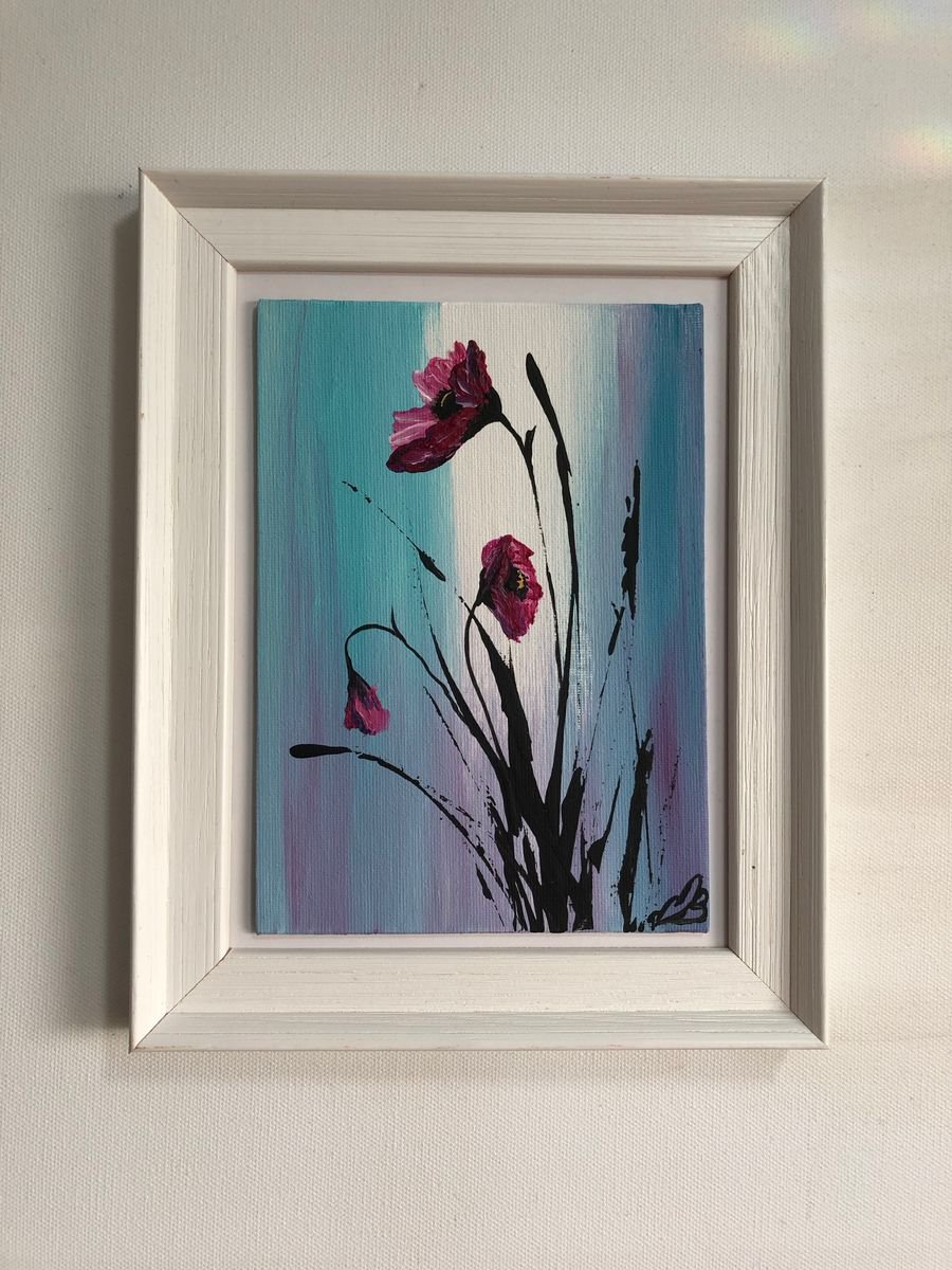 Purple poppies in a frame by Marja Brown