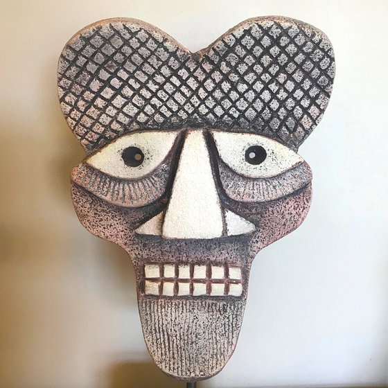 Ceramic Mask One on solid steel stand