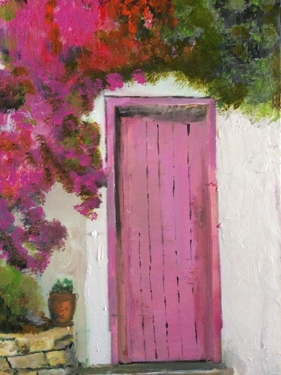 Mediterranean House with Pink Flowers