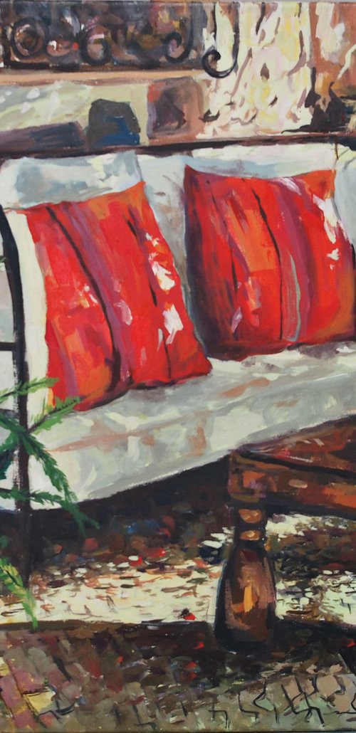 Sofá con cojines rojos by Amaya Fernández Fariza
