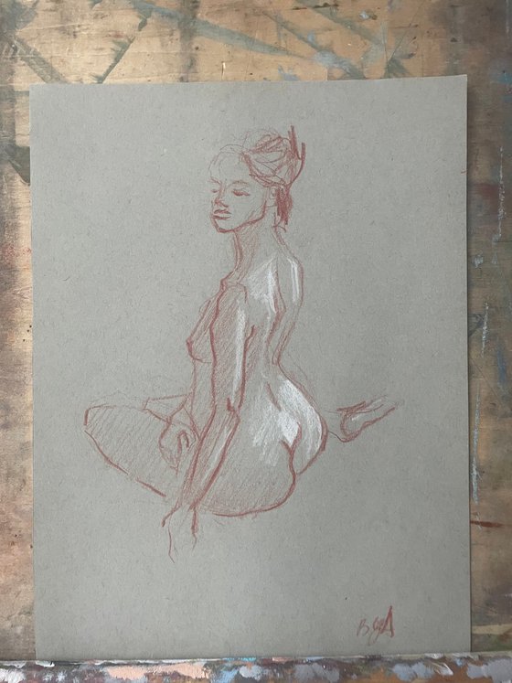 nude drawing. back-sitting model