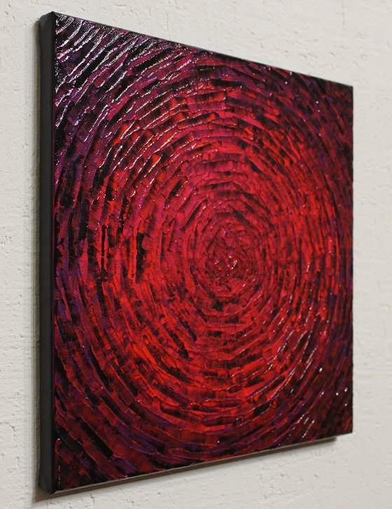 Concentric purplish red burst