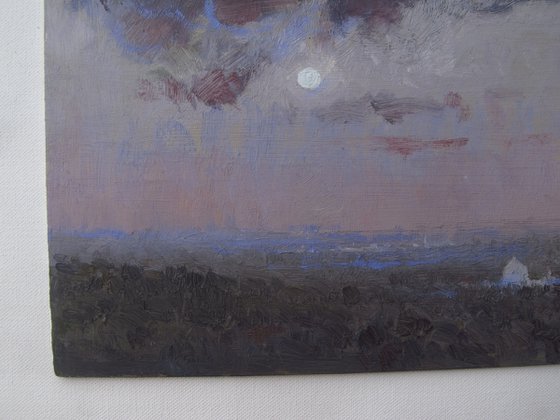 Heavy clouds, light moon