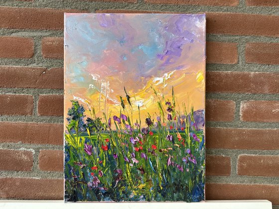 Yellow sunset with flowers