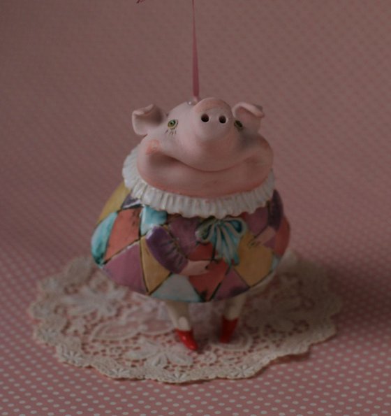 Little piggy in harlequin dress. Hanging sculpture, bell doll by Elya Yalonetski