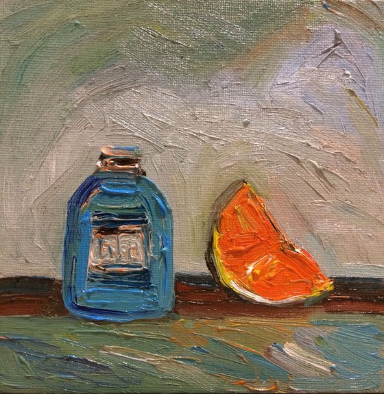 Orange slice and Blue Bottle