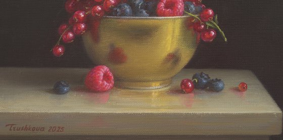 Berries in a golden bowl