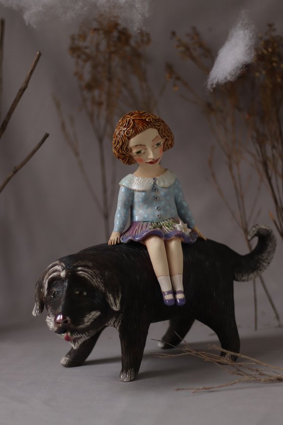 Riding your dreams. Girl on a dog