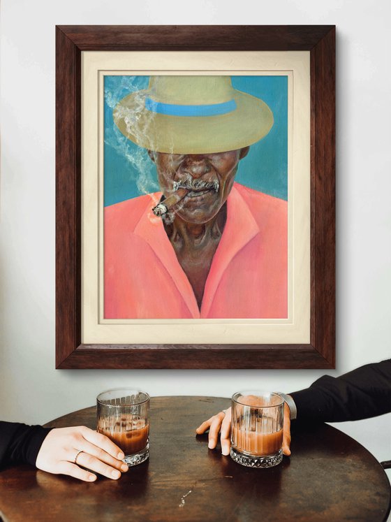Smoking man in a hat